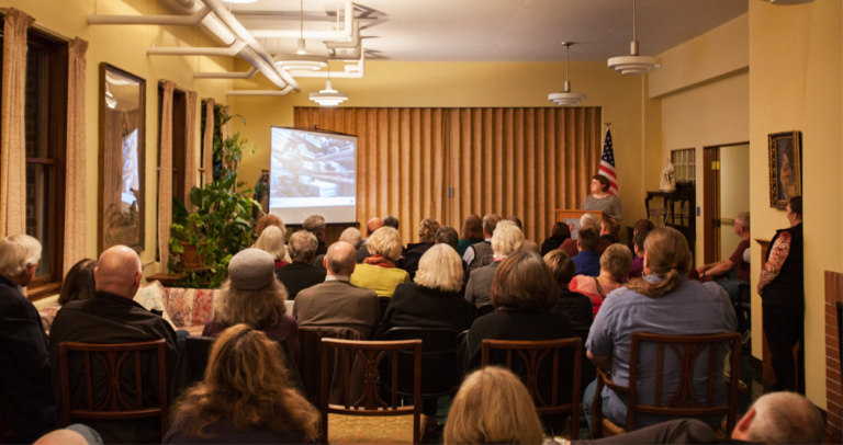 Photo of Rachael Meyer presenting at the ceremony