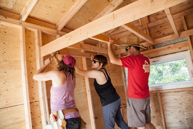 Weber Thompson staff working on the interior of the Tiny House.