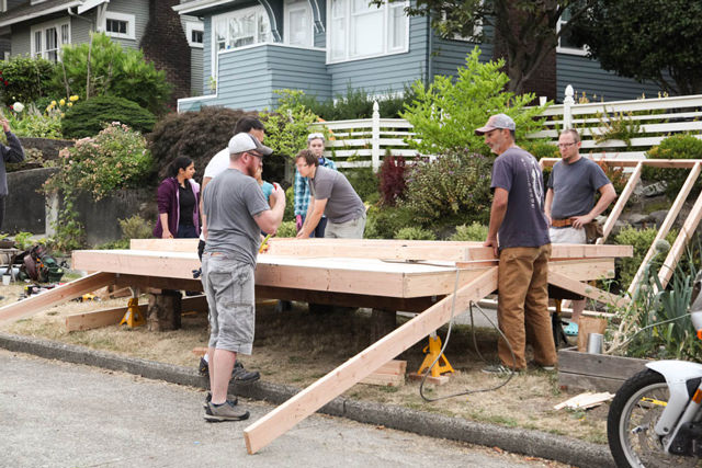 Photo of Weber Thompson staff working on the LIHI Tiny House