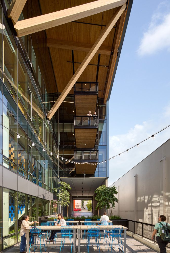 photo of the exterior courtyard at 35 stone on a sunny day with people mingling