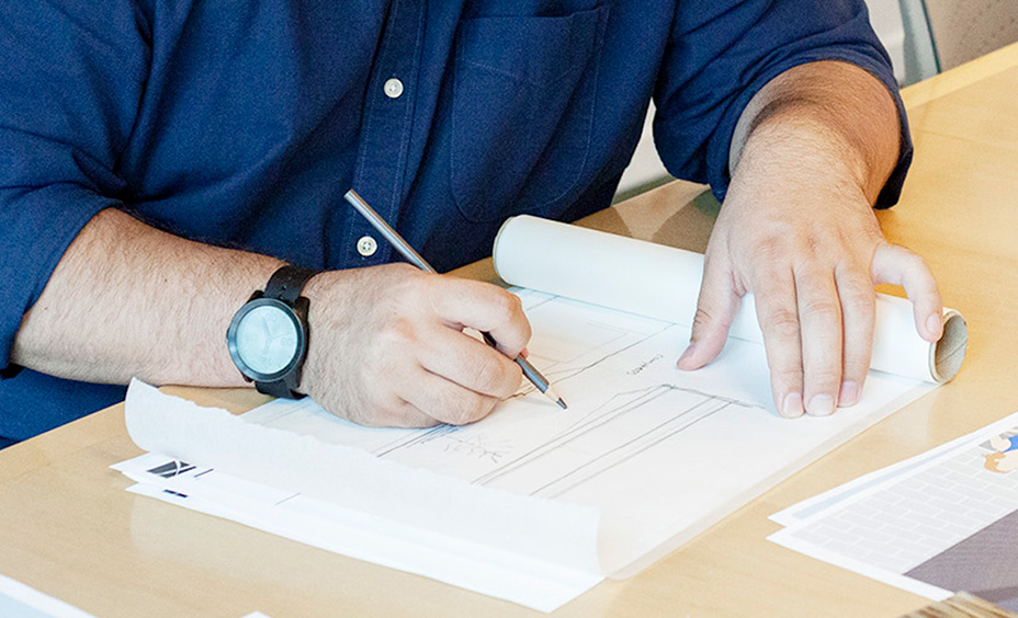 Photo of man making an architecture sketch