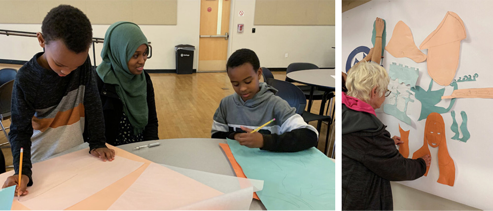 Photo of the Orenda community members working on the mural art concept