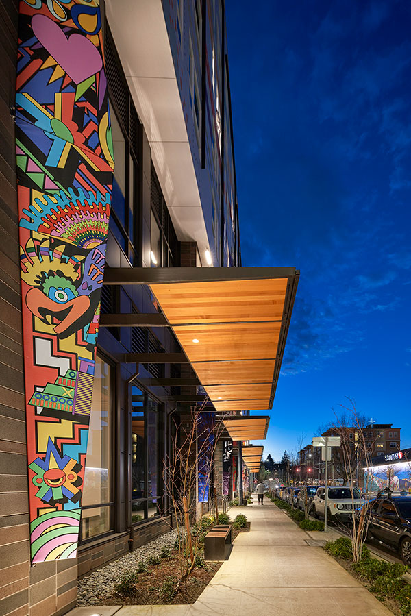 Photo of art pillars at Orenda at night