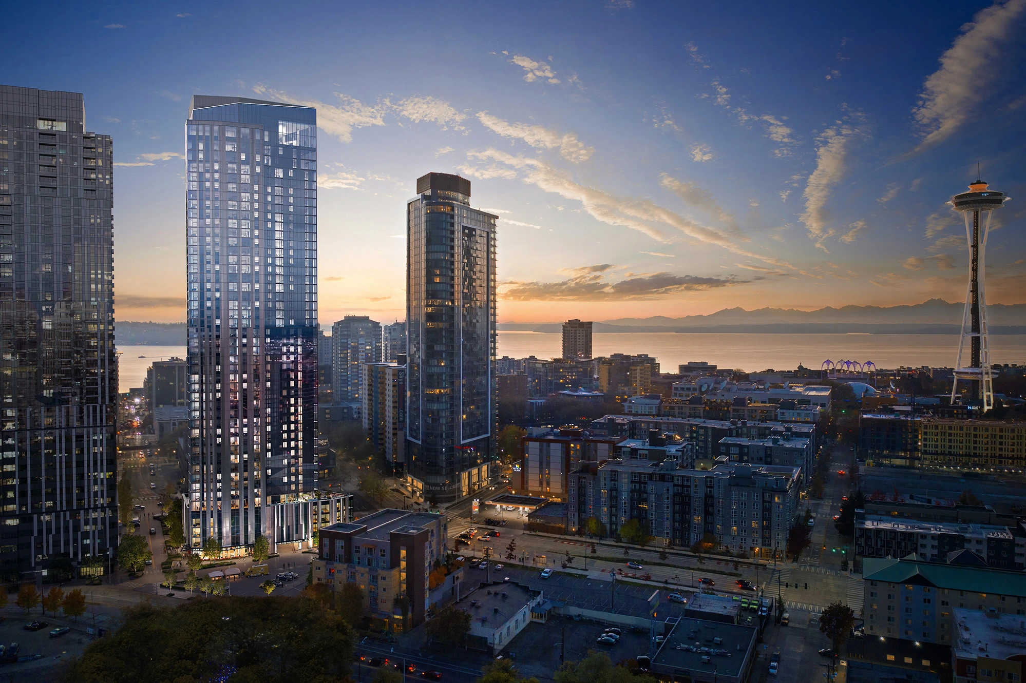 Rendering of aerial view of 616 Battery next to the Space Needle at dusk