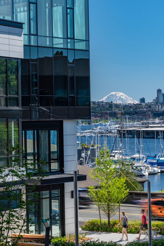 Photo of Watershed and lake union in fremont with mt. rainier in the background on a sunny day