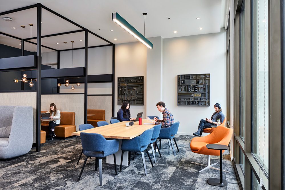 Photo of students studying in an amenity space at The Accolade