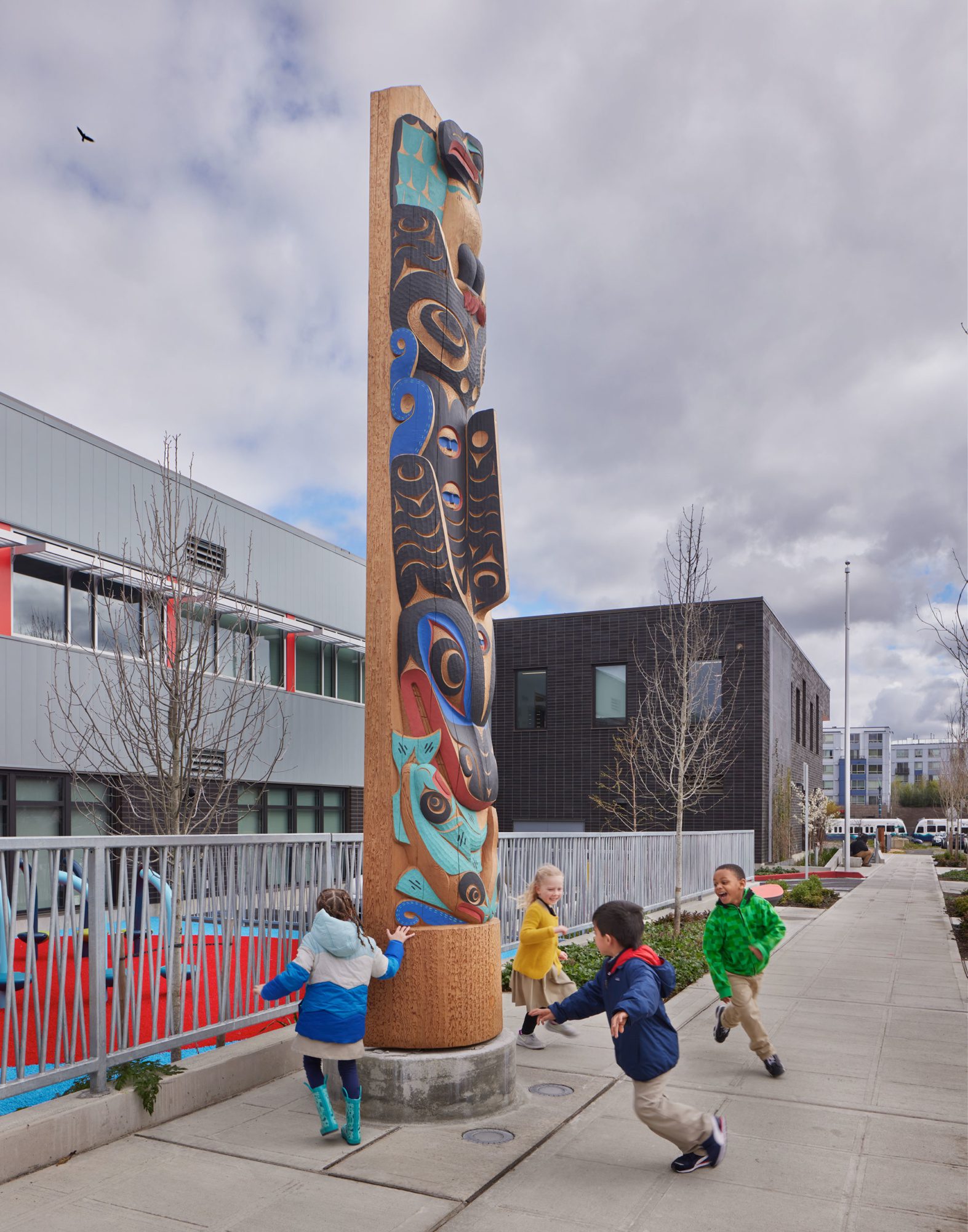 Totem pole feature at Othello Square's Salish Sea school