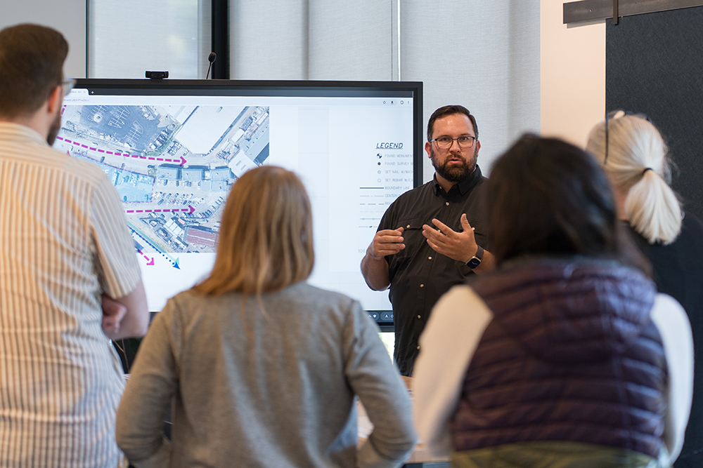 photo of principal cody lodi talking about design inside the weber thompson office