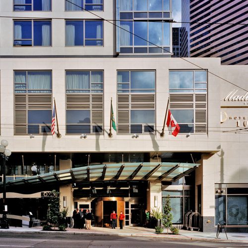 photo of hotel 1000 madison tower entrance during the day