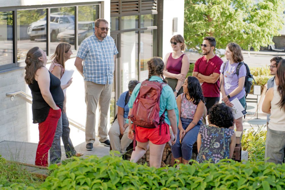 photo of spu beyond code team members leading a tour at thte aurora bridge bioswales
