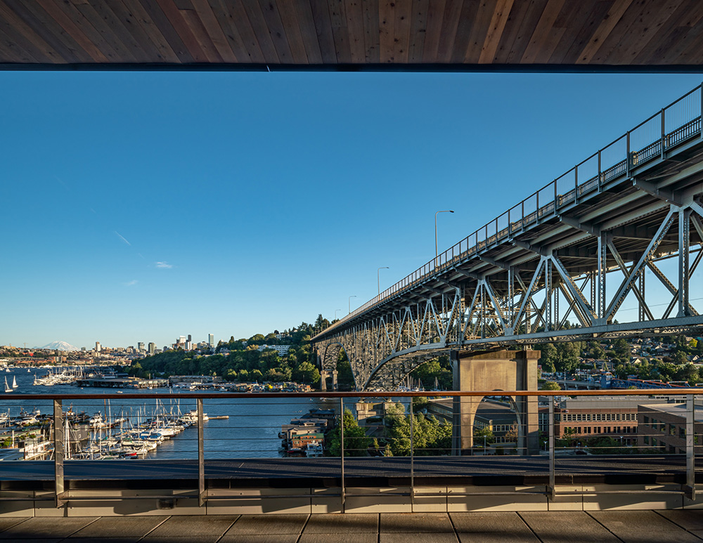 photo of the top level of Watershed looking out over Lake Union with the Aurora Bridge to the right